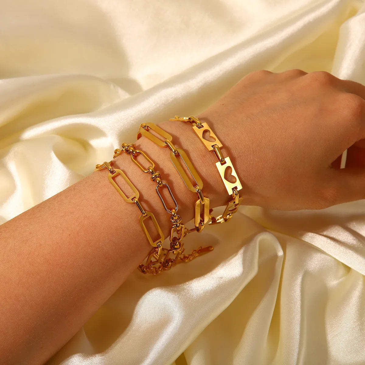 women's heart-shaped bracelets-Simple Hollow Chain Cross Buckle 18k Gold-plated Stainless Steel Bracelet