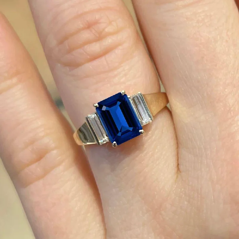 women's vintage-style engagement rings-2.50 Carat Emerald Shape Three Stone Blue Sapphire Engagement Ring