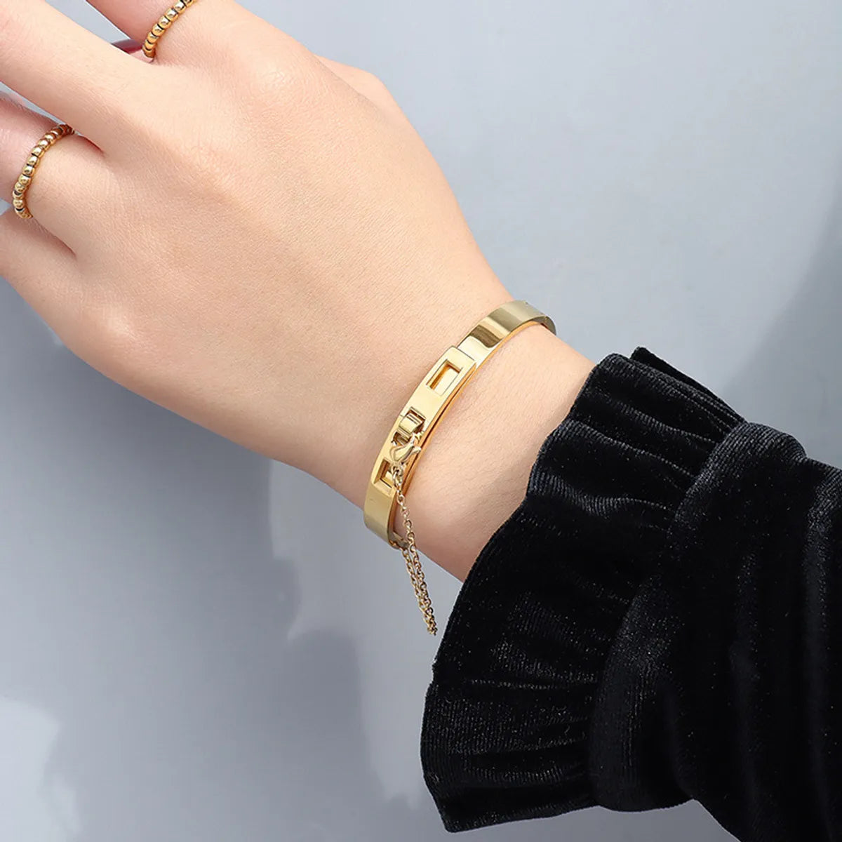 women's stacking bangles-Chain Tassel Titanium Steel Gold Plated Bracelet