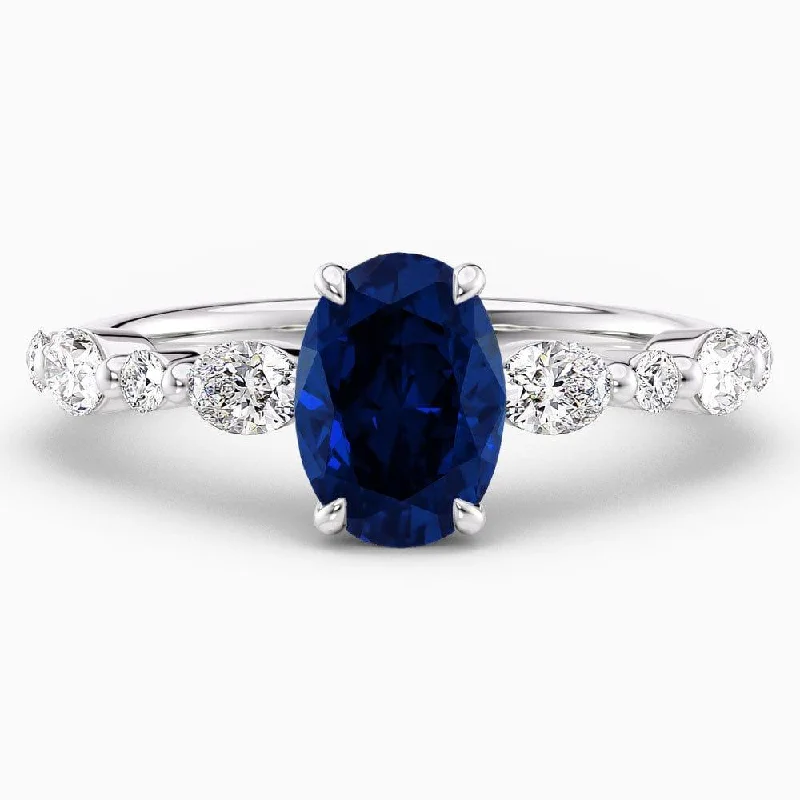 women's wedding engagement diamond rings-2 Carat Oval Shape Shared Prong Blue Sapphire Engagement Ring