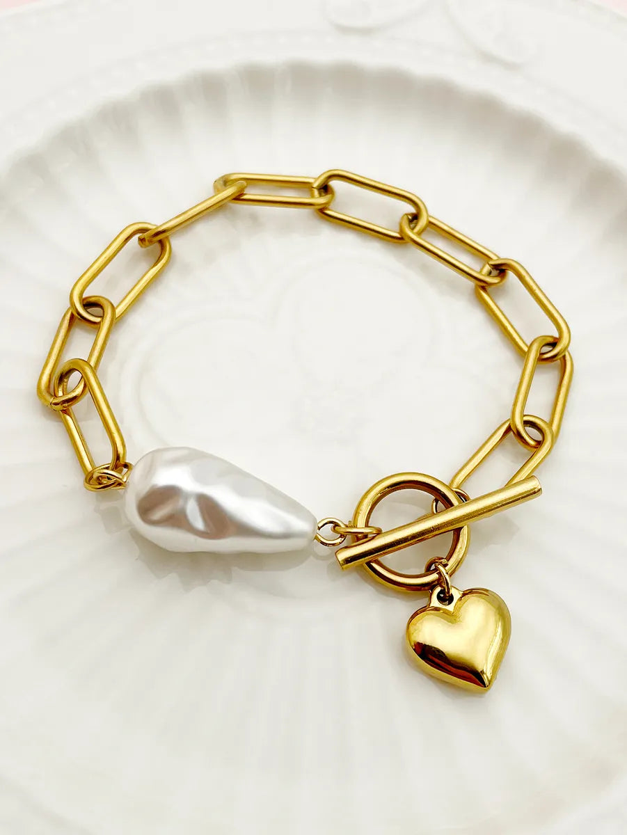 women's gemstone bracelets-Artistic Heart Shape Stainless Steel Polishing Pearl Plating Gold Plated Bracelets