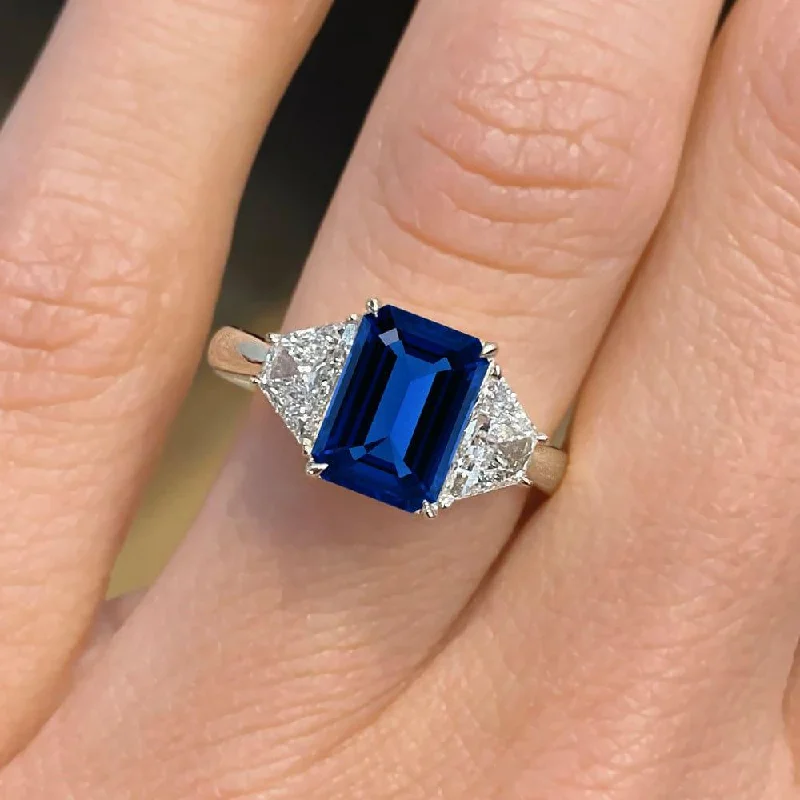 women's custom oval engagement rings-3 Carat Emerald Shape Three Stone Blue Sapphire Engagement Ring