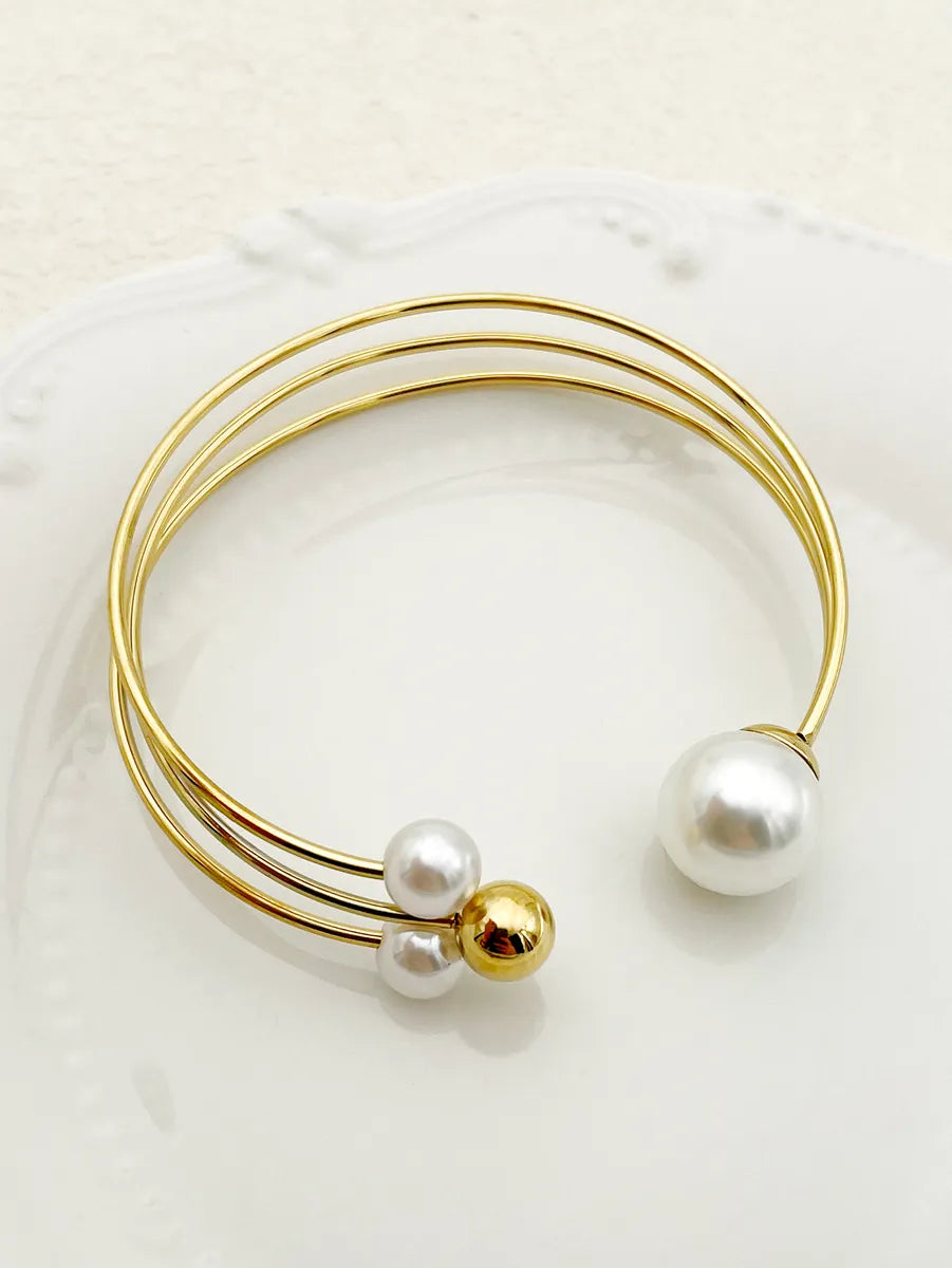 women's crystal charm bracelets-Classic Style Commute Pearl Stainless Steel Polishing Plating Gold Plated Cuff Bracelets